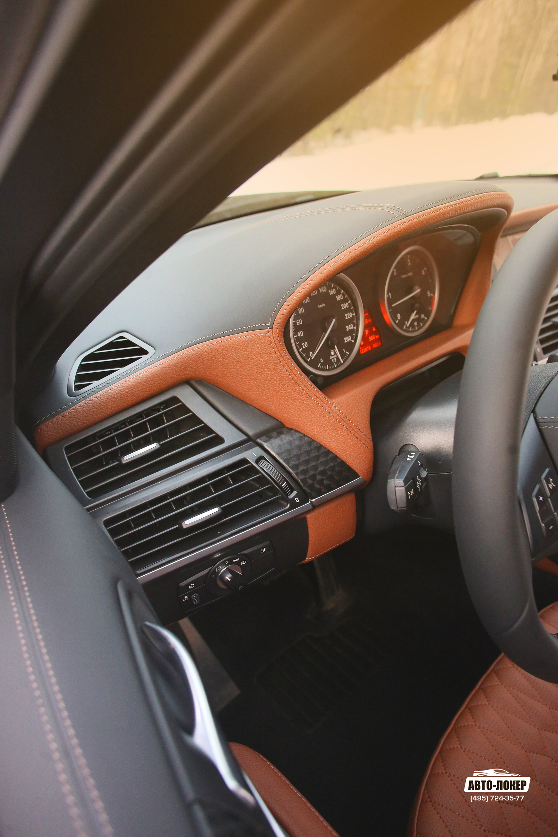 Перетяжка торпедо салона кожей BMW X6 (E71)