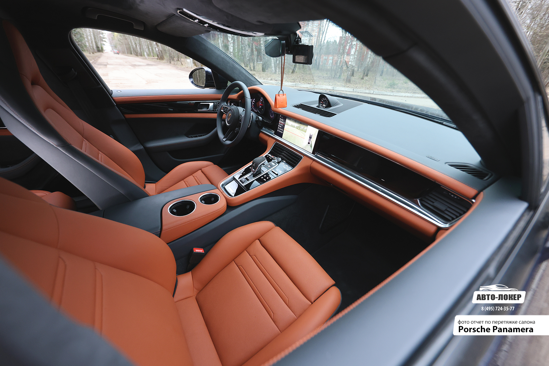 Перетяжка торпедо салона кожей Porsche Panamera